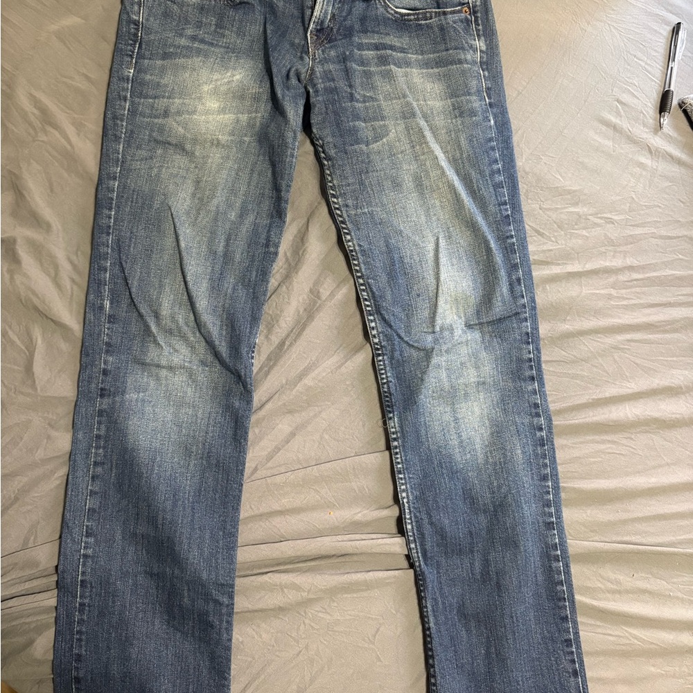3.Levi's Straight Leg Blue Jeans